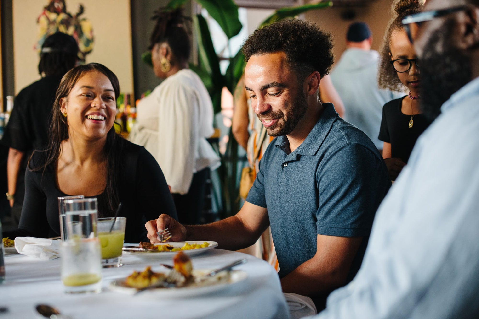 Handsome couple enjoying brunch