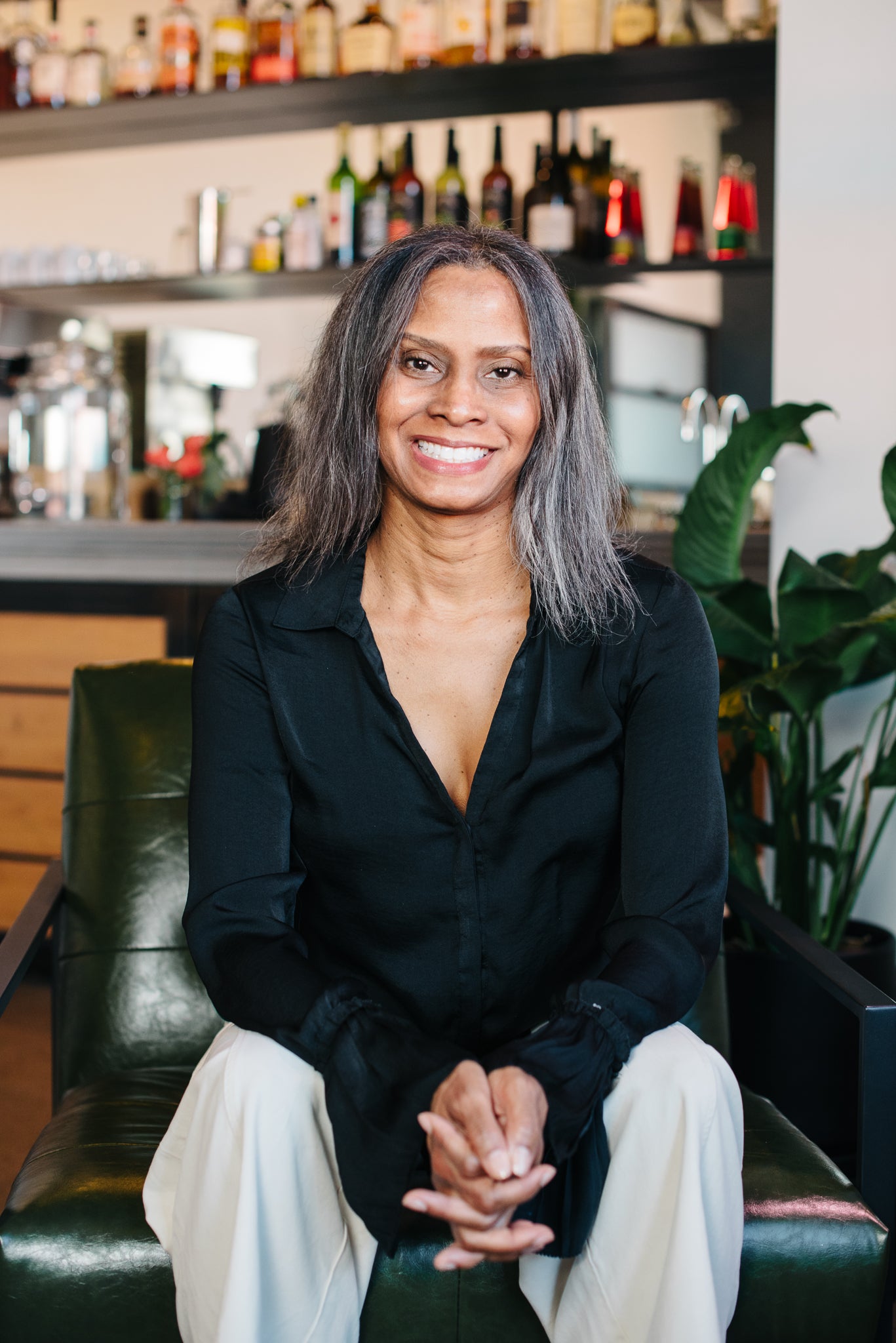 Beautiful lady author, sitting and smiling